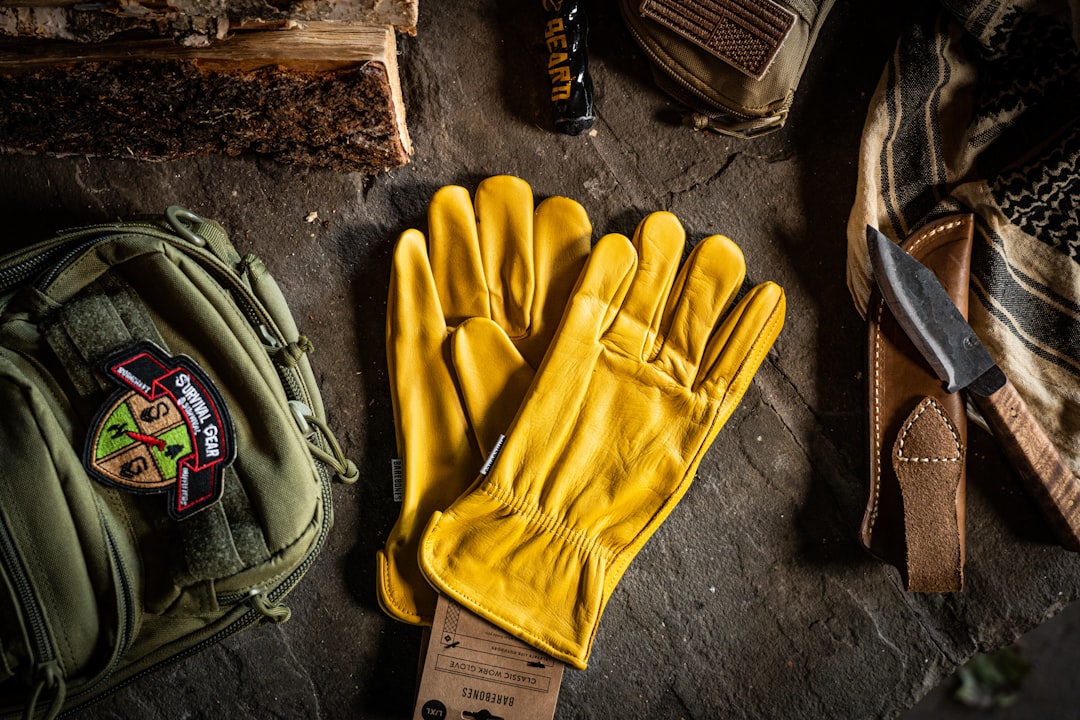 about-us a-pair-of-yellow-gloves-sitting-on-top-of-a-table-qhd4yj8e6wq